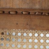 Antique solid wood chair with caning, country house style.