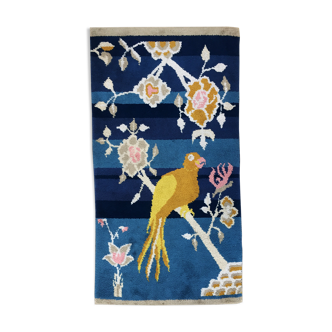 Bird-patterned wool rug