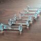 6 vintage pressed glass knife rests