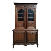 Buffet with 2 bodies in carved oak, Louis XV style, 19th century.