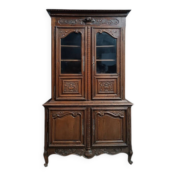Buffet with 2 bodies in carved oak, Louis XV style, 19th century.
