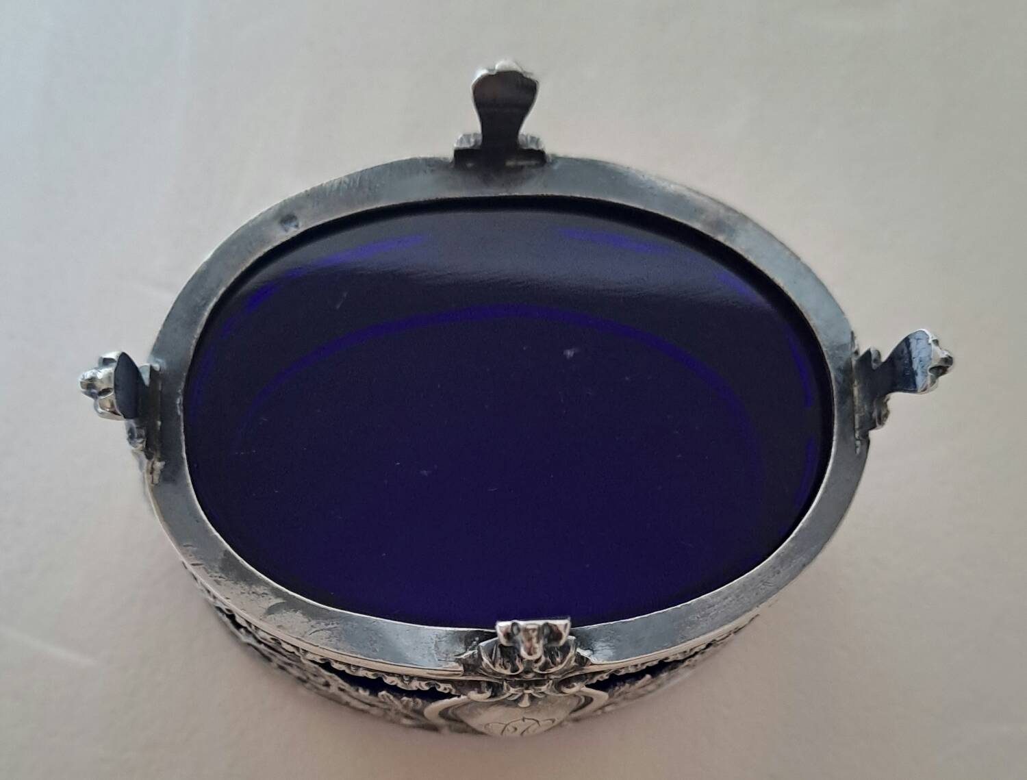 Louis XVI style salt cellar with silver collar mount and blue glass