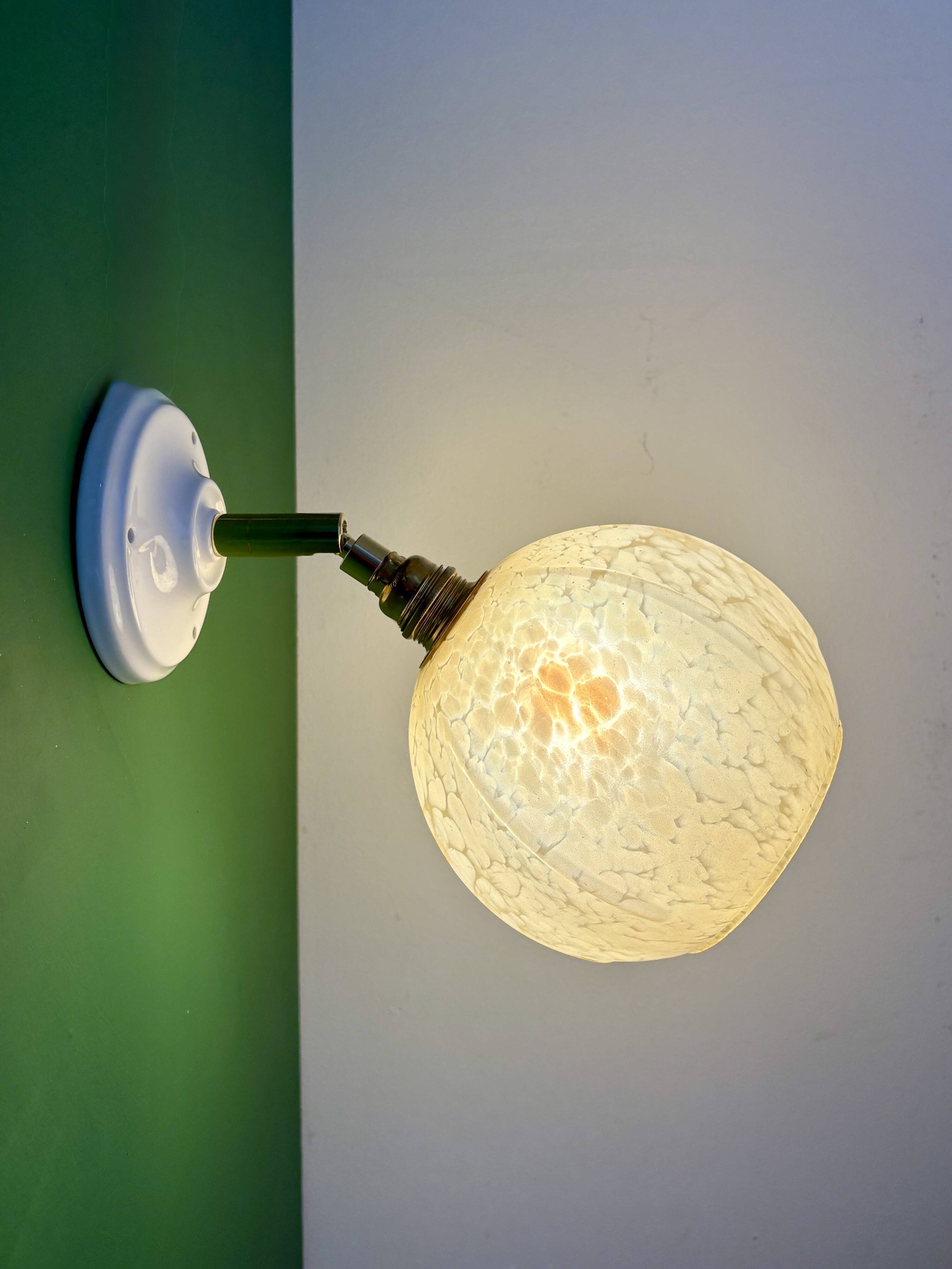 Vintage yellow glass globe wall light