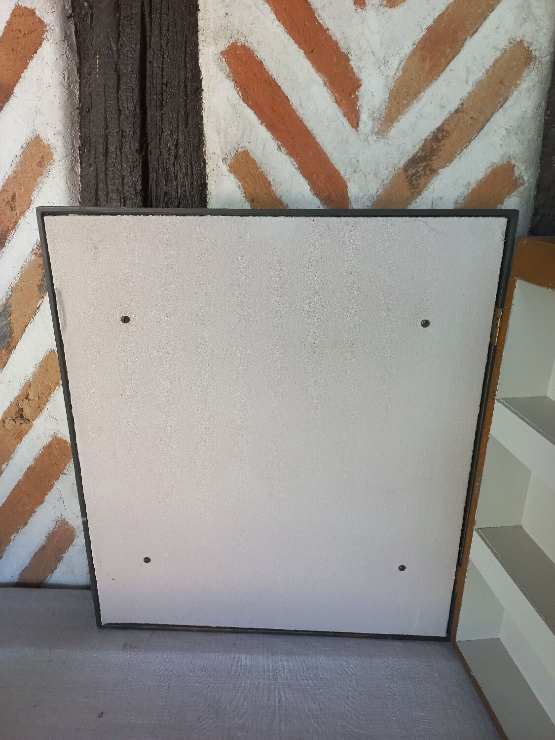 Golden frame secret shelf