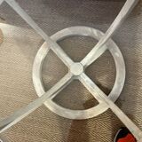 Oval patinated wood and beveled glass coffee table