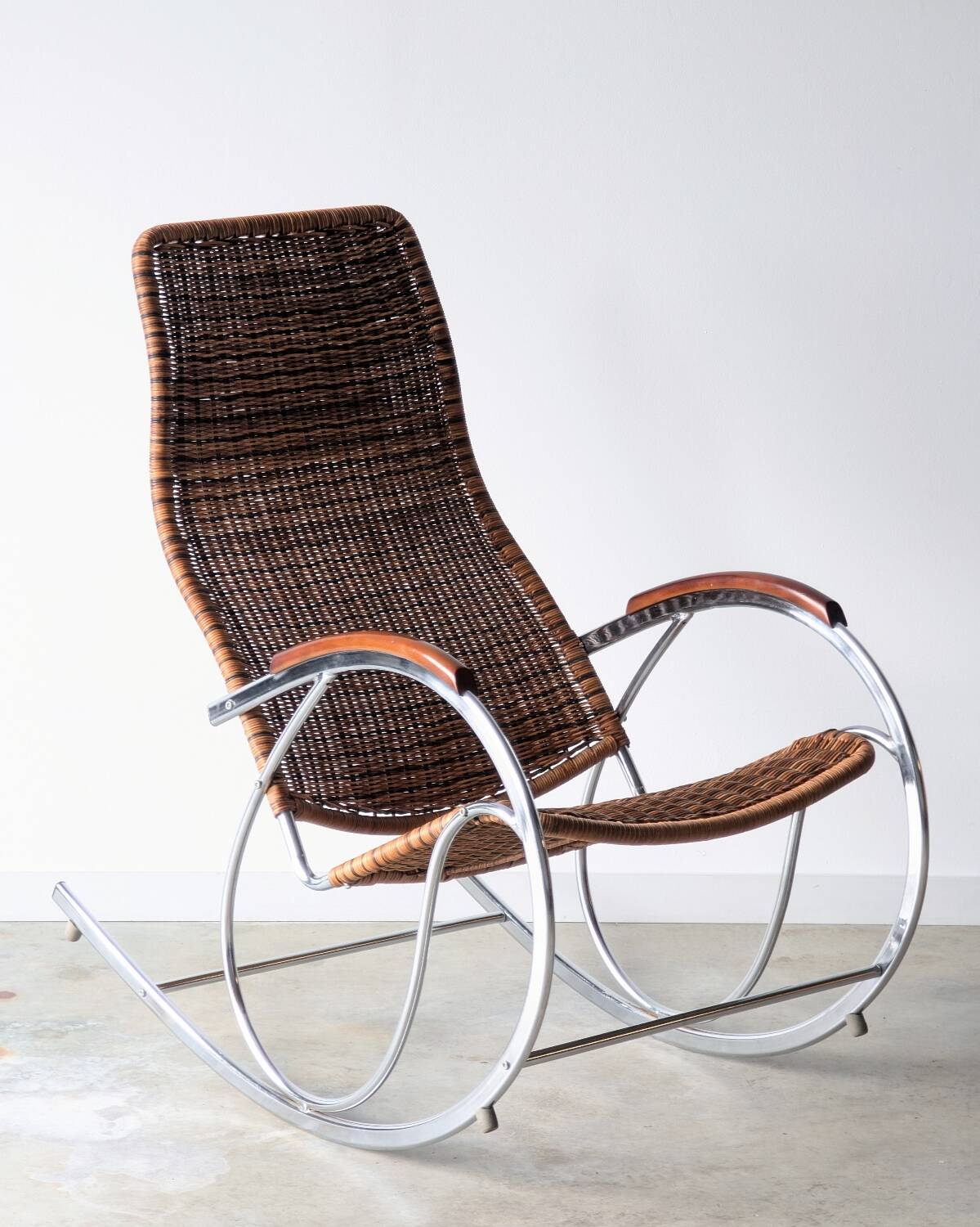 Vintage Thonet rocking chair in chrome and rattan, 1970.