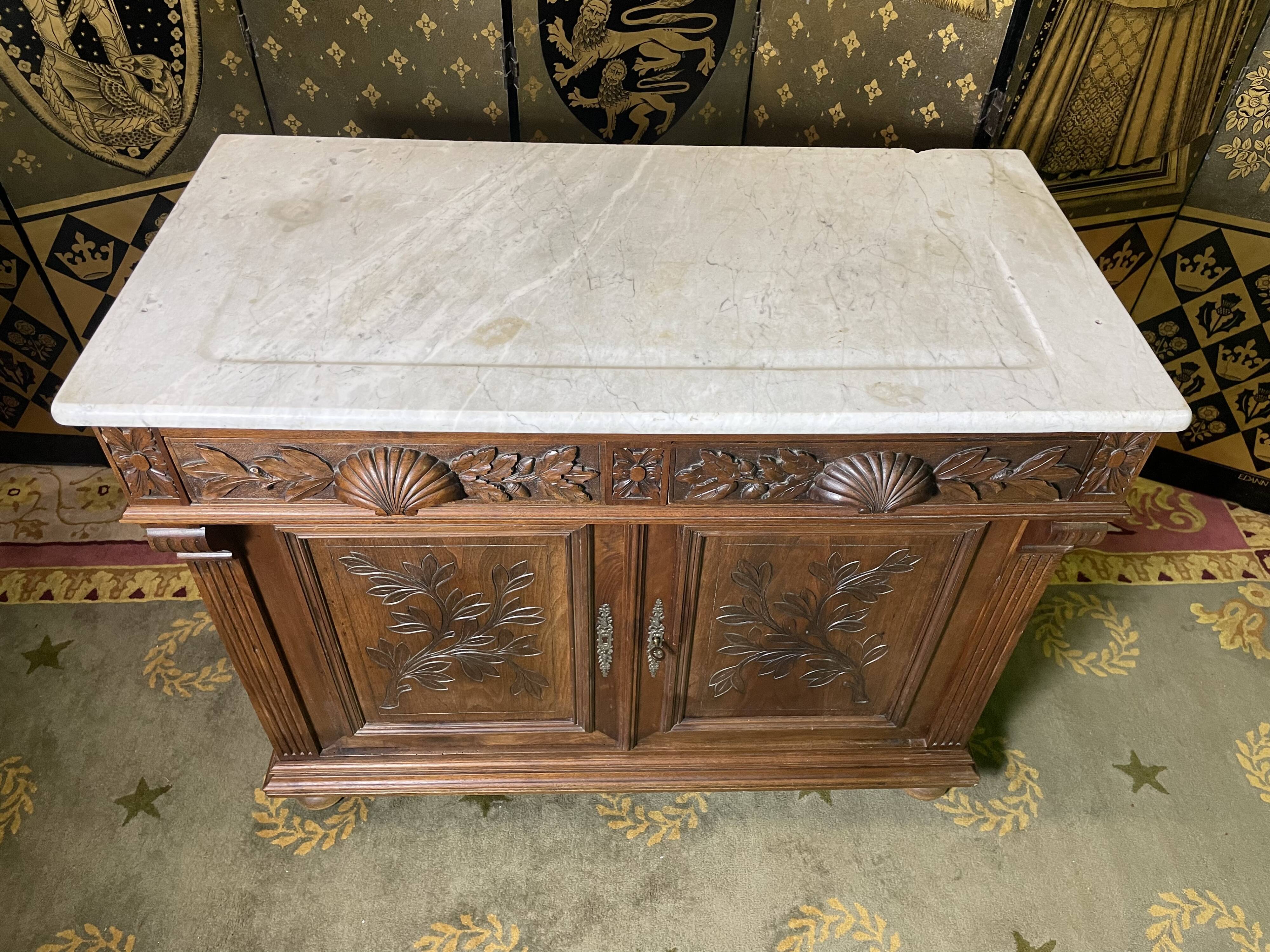 Carved walnut vanity