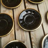 Set of 9 cups and sub-cups in black ceramic and colored gold border
