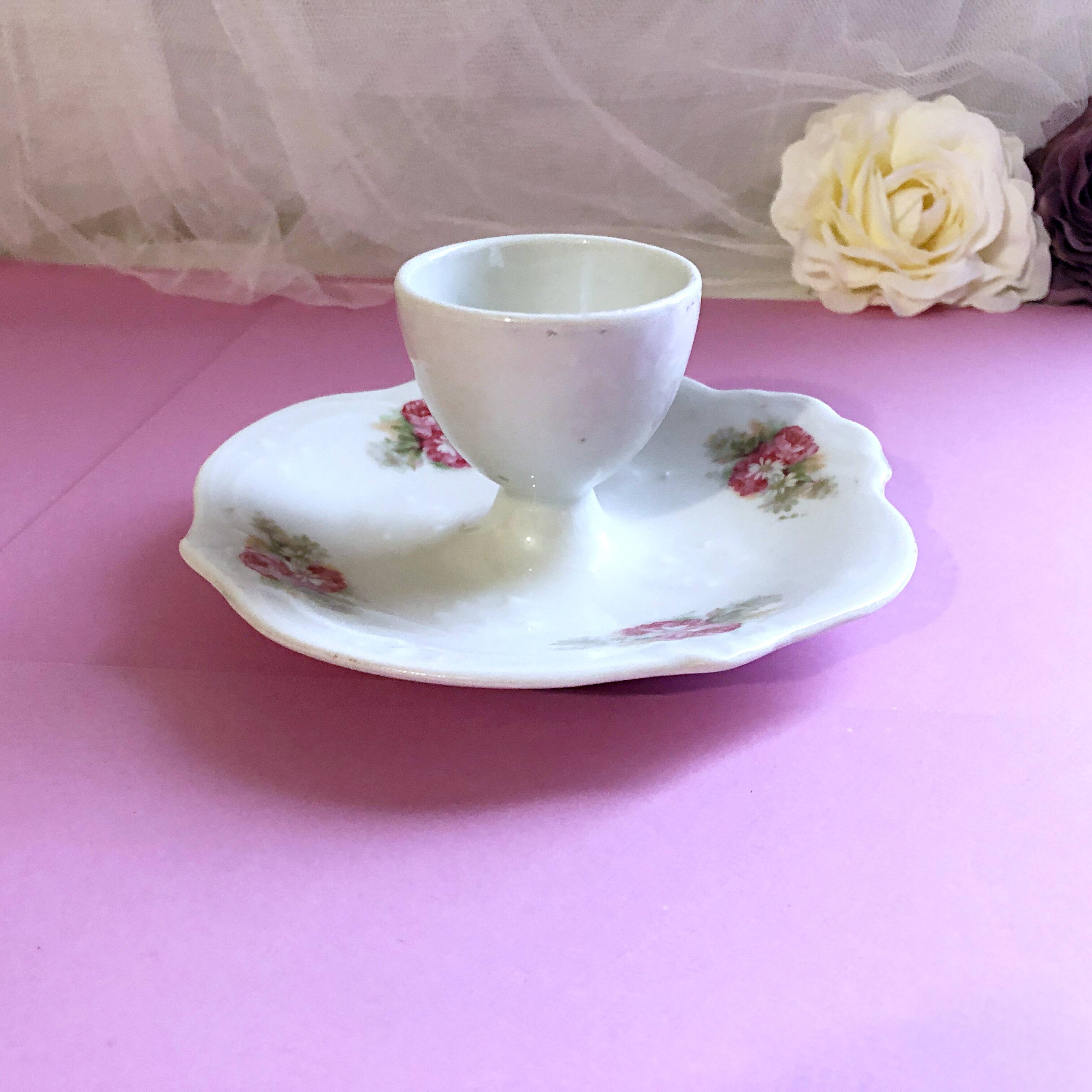 Porcelain egg cup with shabby chic style floral bouquet decoration Romanticism