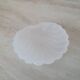Scallop shell butter dish in stainless steel with its white glass saucer.