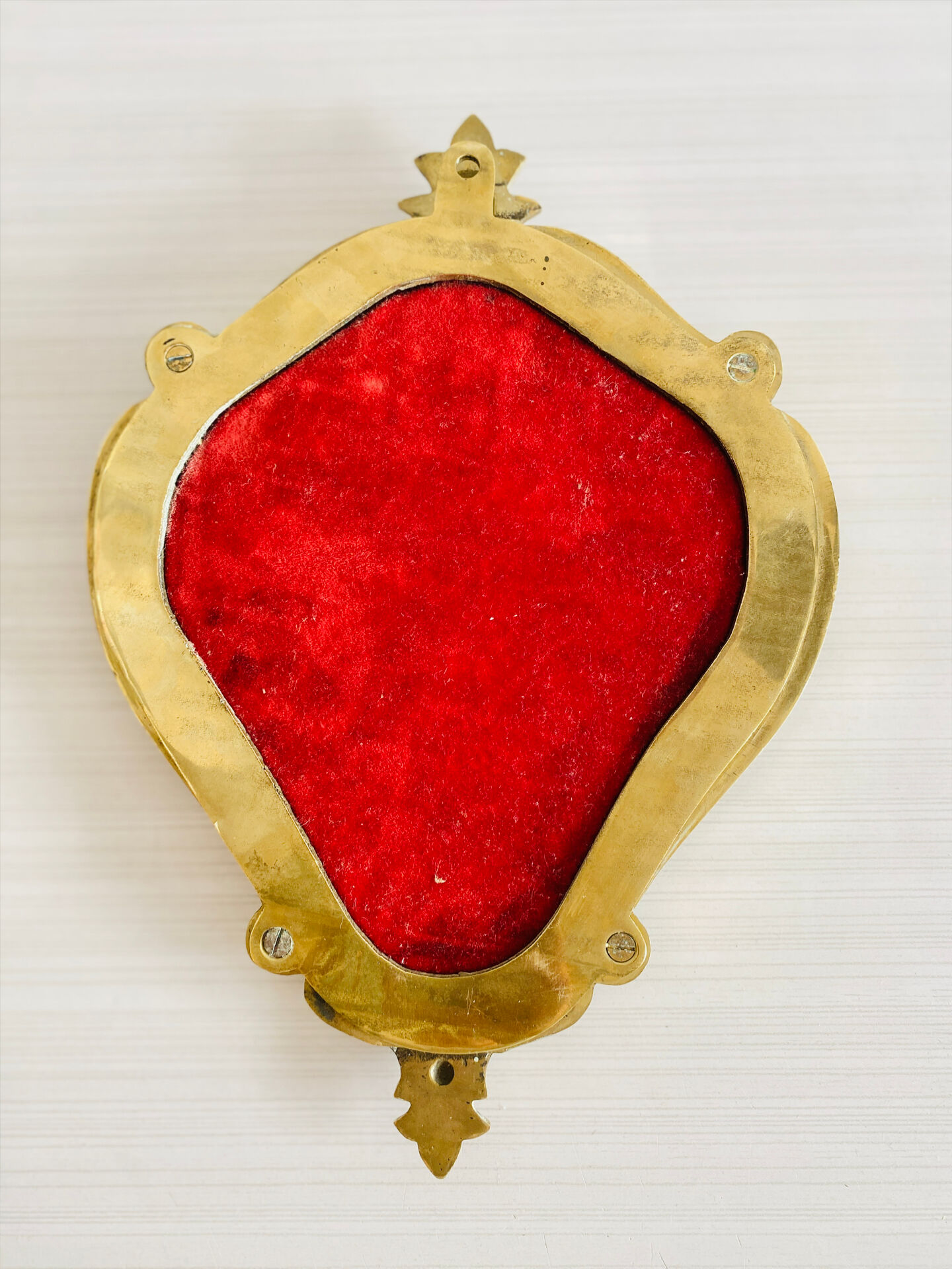 Small antique mirror in baroque style – gold frame in bronze or brass.