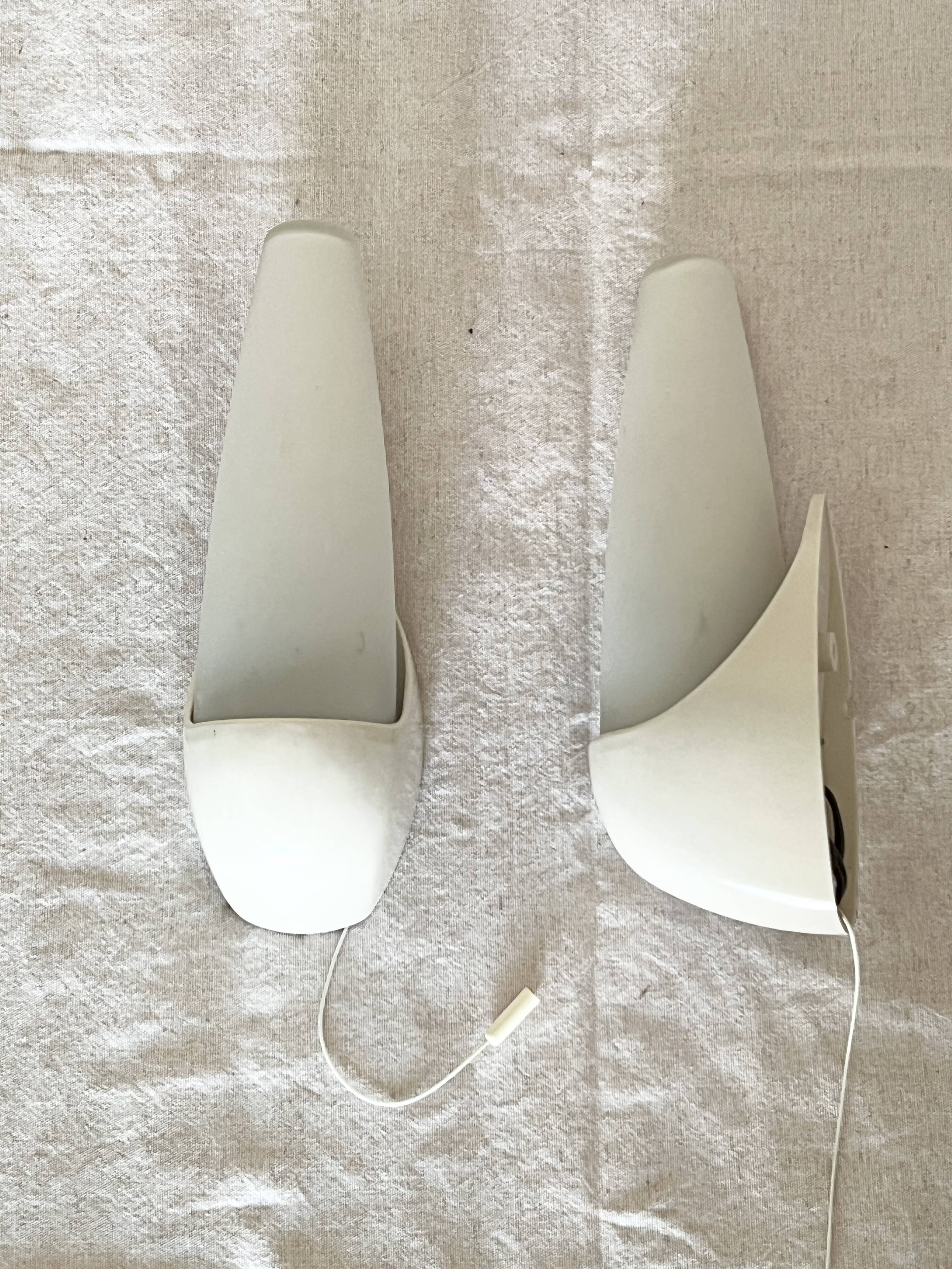 Set of two Small mid-century bakelite & glass wall lamps by Bo Niko Belgium, 1960s