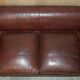Vintage Art Deco leather sofa, three-seater, feather cushions.