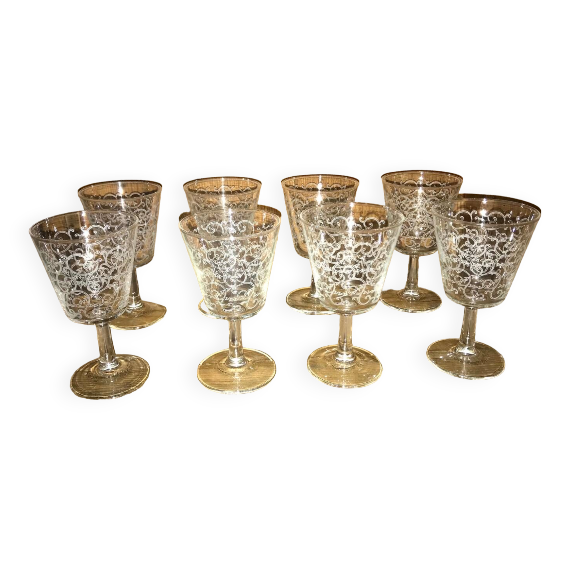 Set of old glasses with white arabesque pattern