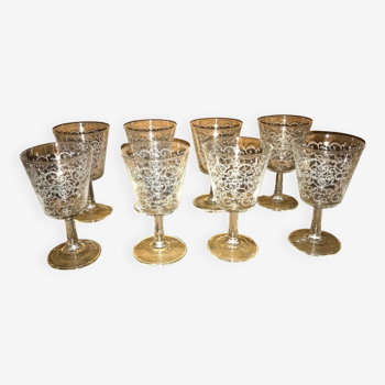 Set of old glasses with white arabesque pattern