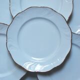 White and gold porcelain plates