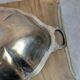 Antique oval silver-plated copper tray with handles.