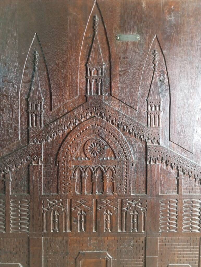 Large sculpted panel façade cathedral Pavia