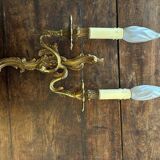 Pair of Louis XV Style wall lights in gilded bronze