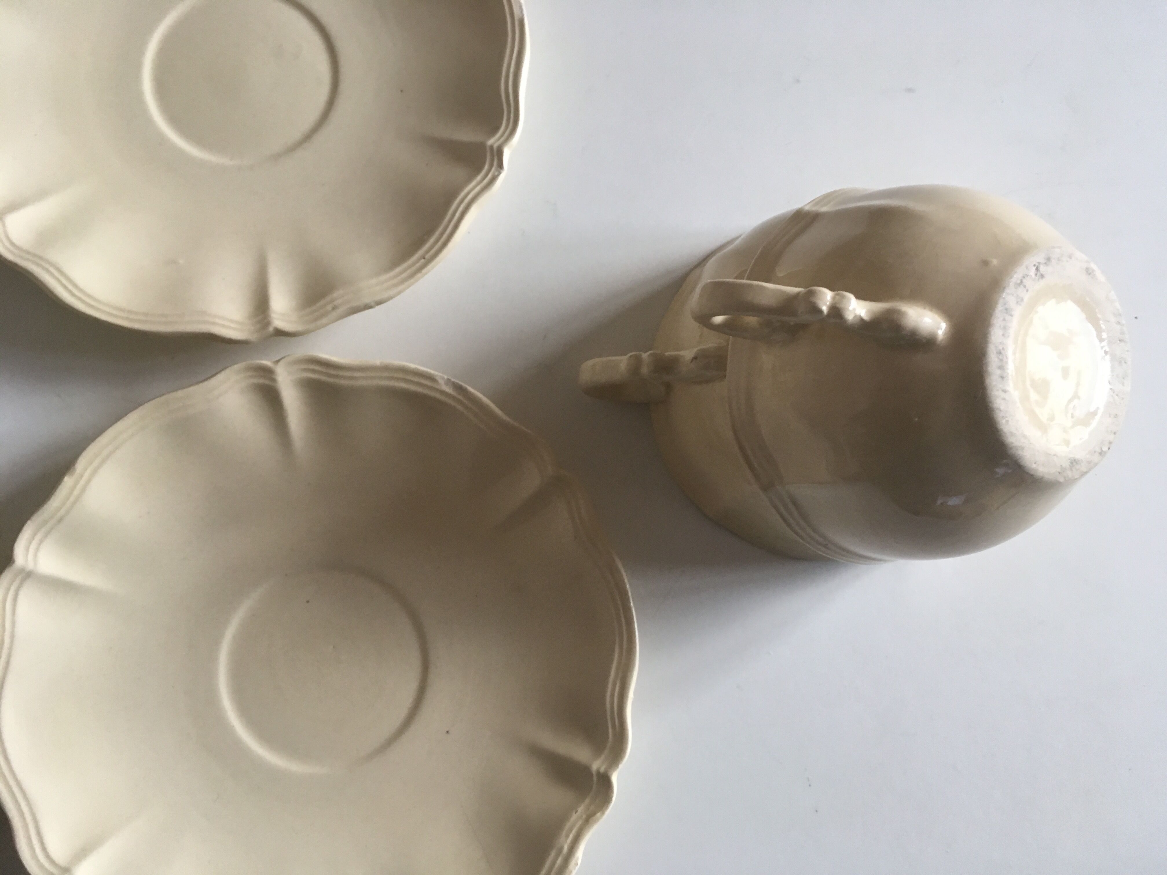 4 cups set in ivory faience from Sarreguemines to godrons