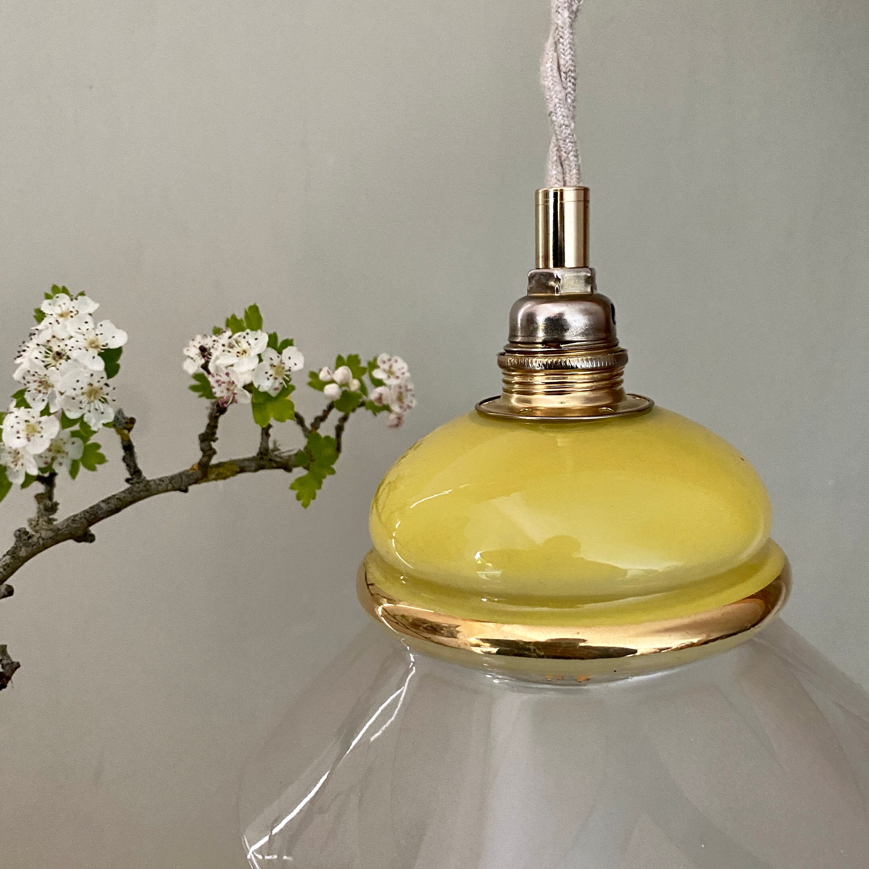 Vintage lampshade ride in yellow and transparent glass