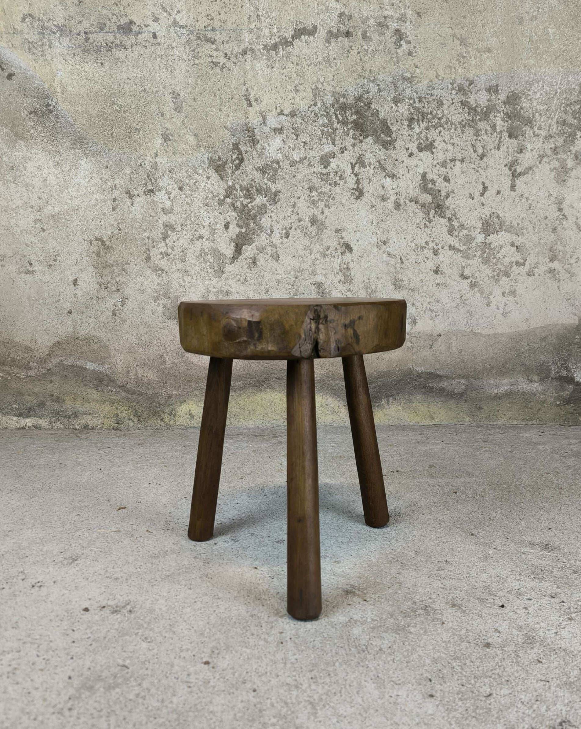Vintage wooden tripod stool.