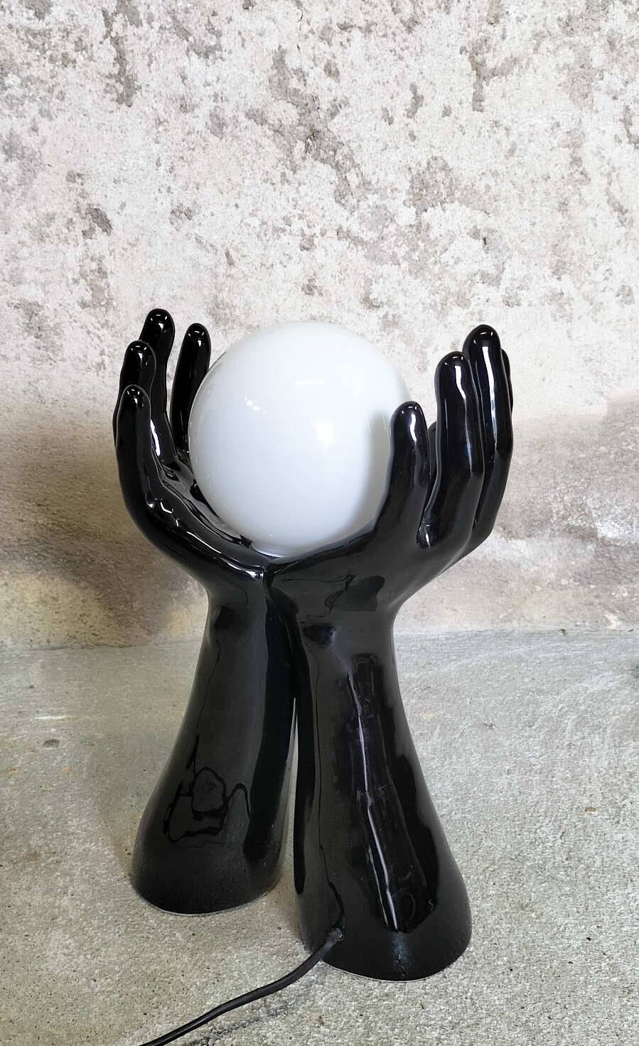 Black and white opaline hand lamp.