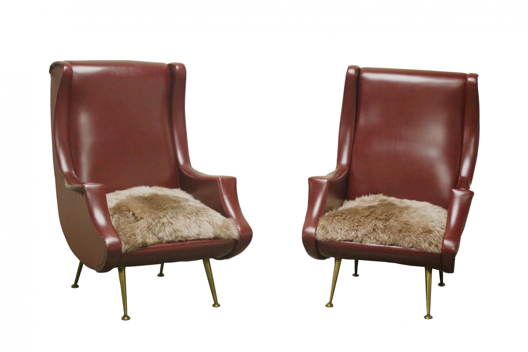 Pair of armchairs vintage with feet brass Italy 1960 s