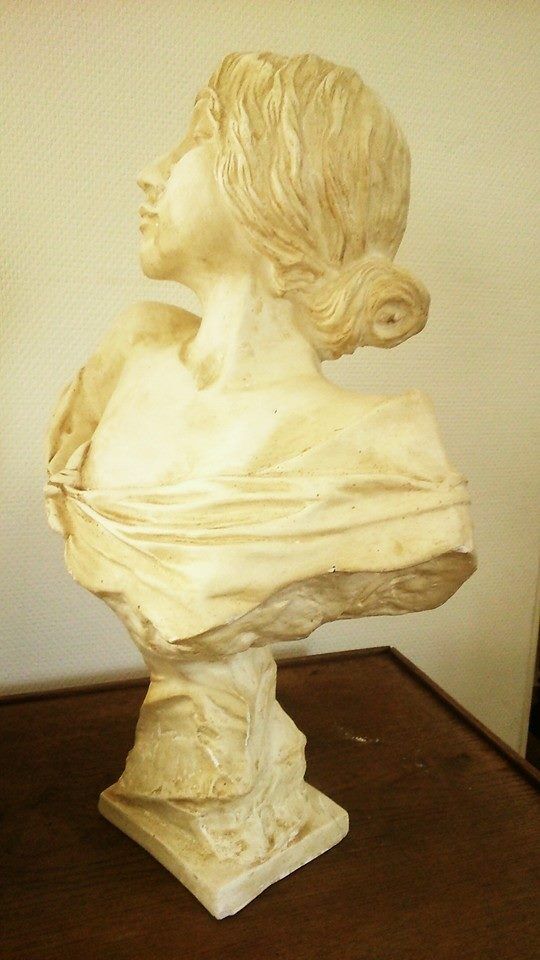 Old plaster bust of woman