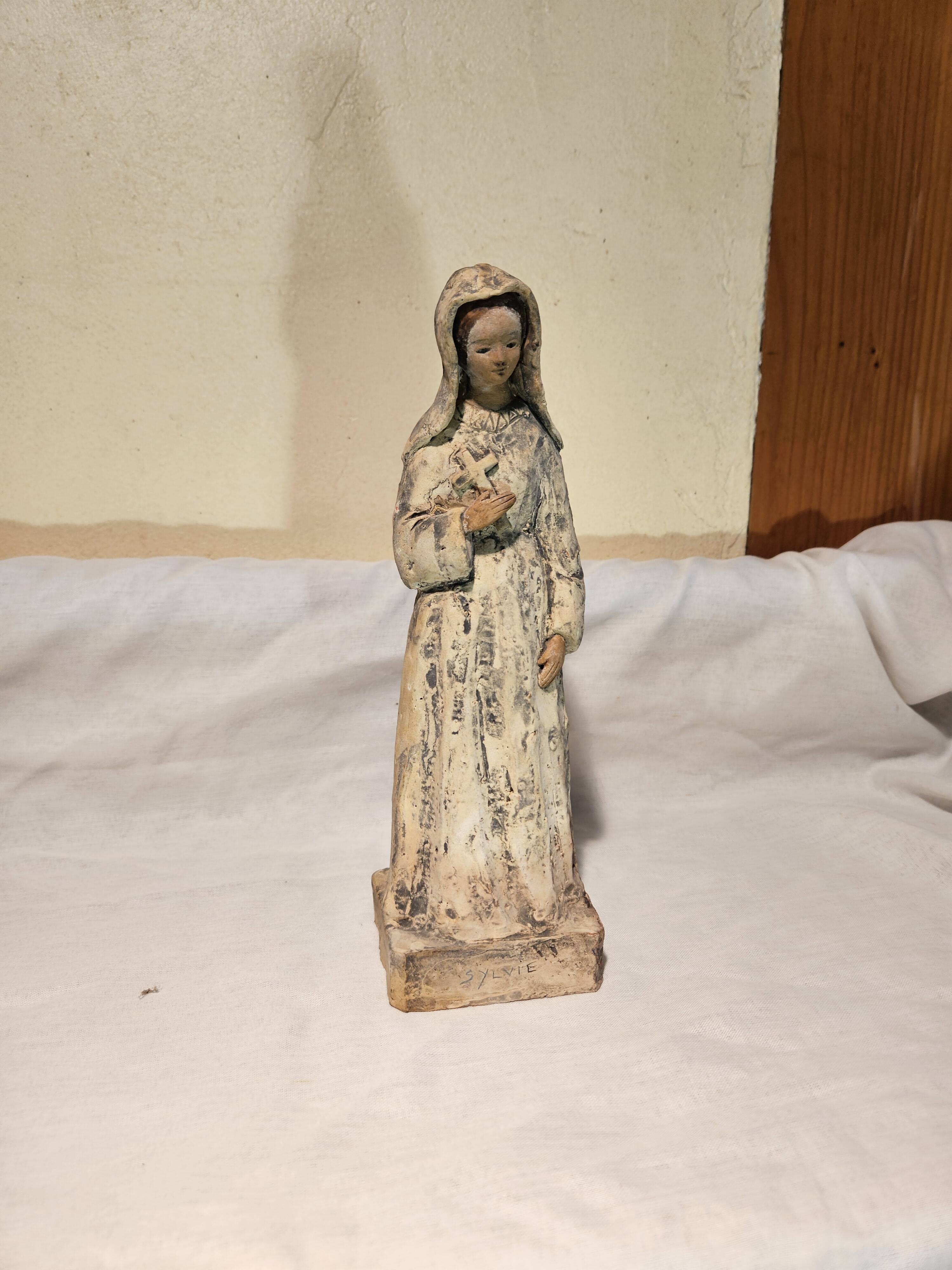 Painted terracotta holy virgin statue