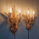Pair of Italian wall sconces in gilded metal
