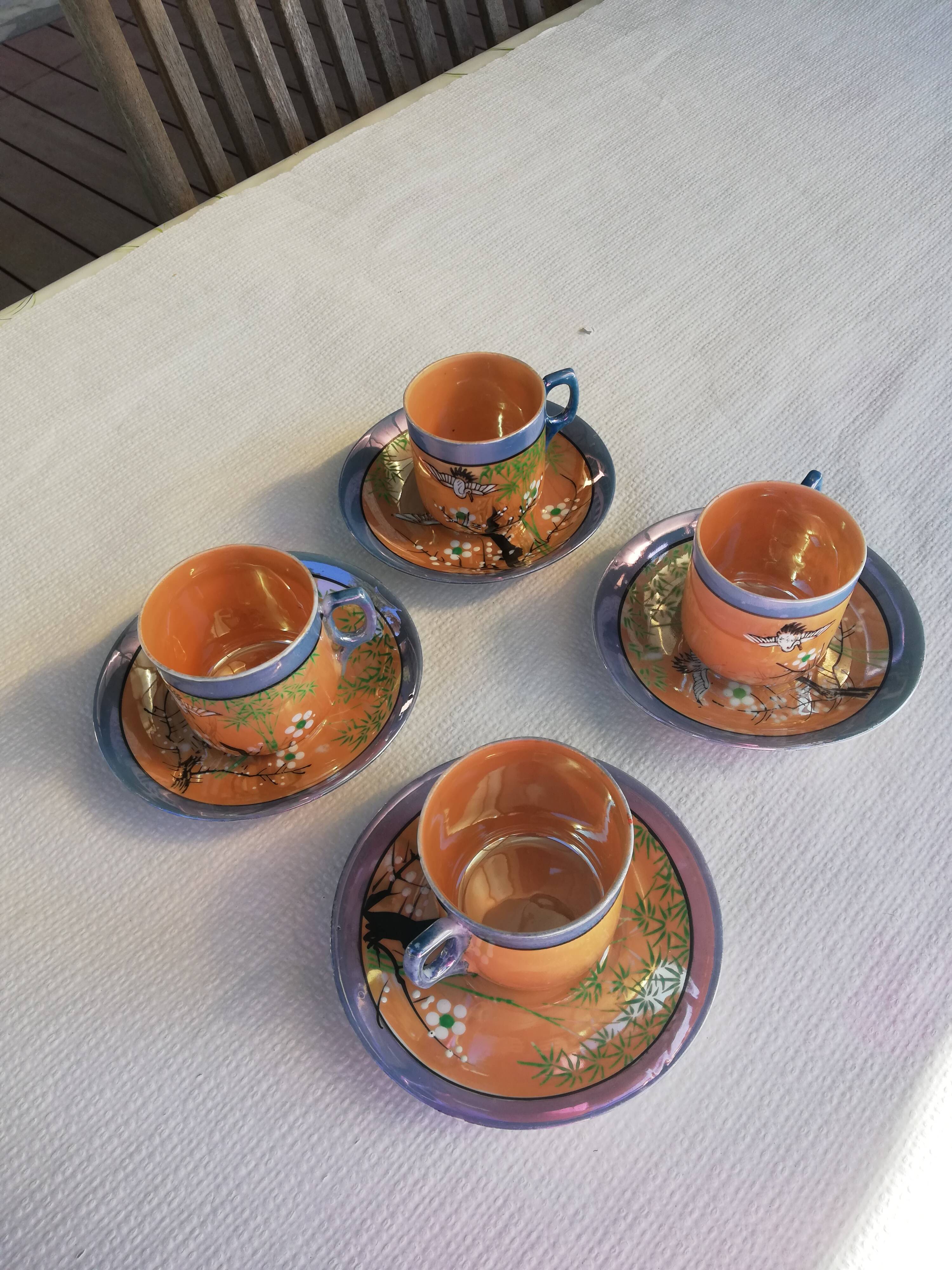 Fine porcelain cups with Japanese decor