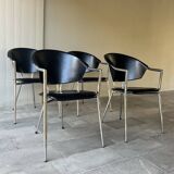 Set of four Italian black leather chairs, 1970