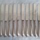 12 knives with silver-plated handles