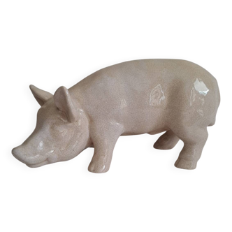 Statue. Cochon en céramique craquelée.