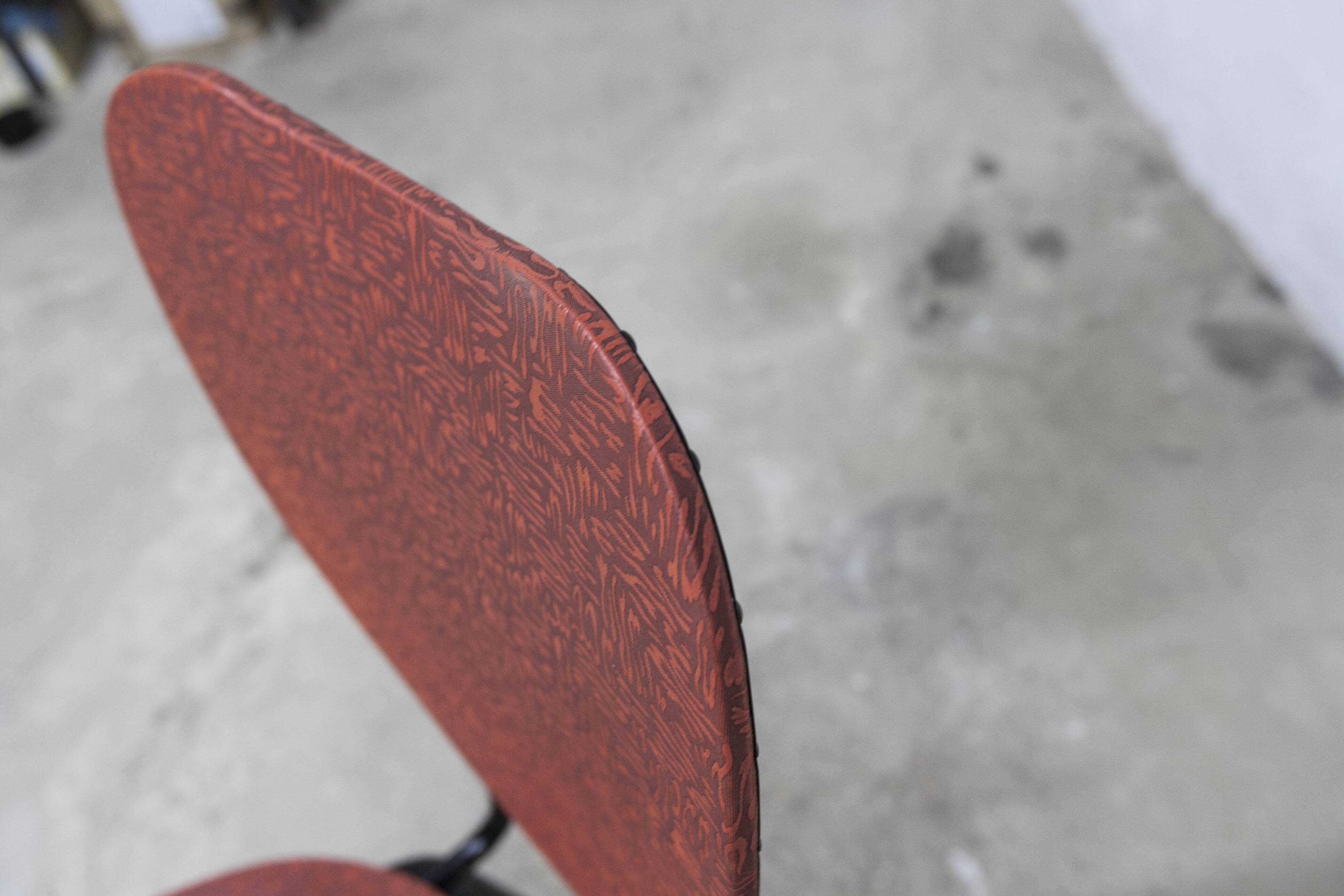 Vintage 70s chair in black lacquered metal and atypical red vinyl