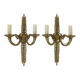 Pair of two-armed Empire wall sconces in gilded bronze
