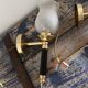 Pair of brass and black torchiere wall lights