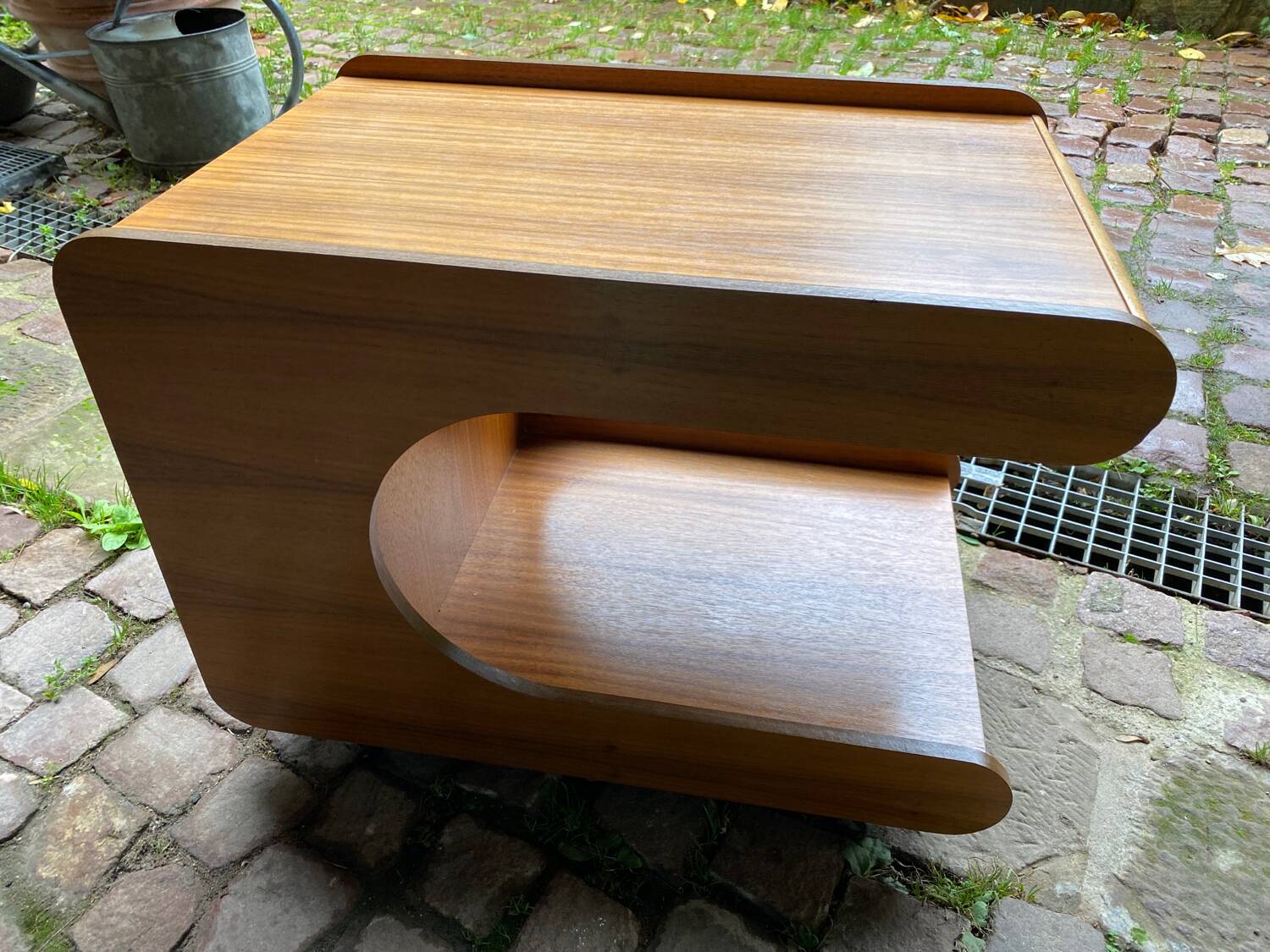 Rolling teak coffee table with foldable top circa 1960