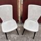 Pair of Chairs Baumann model Essor in imitation white leather, beech compass base