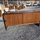 Vintage sideboard with sliding doors from the 60s