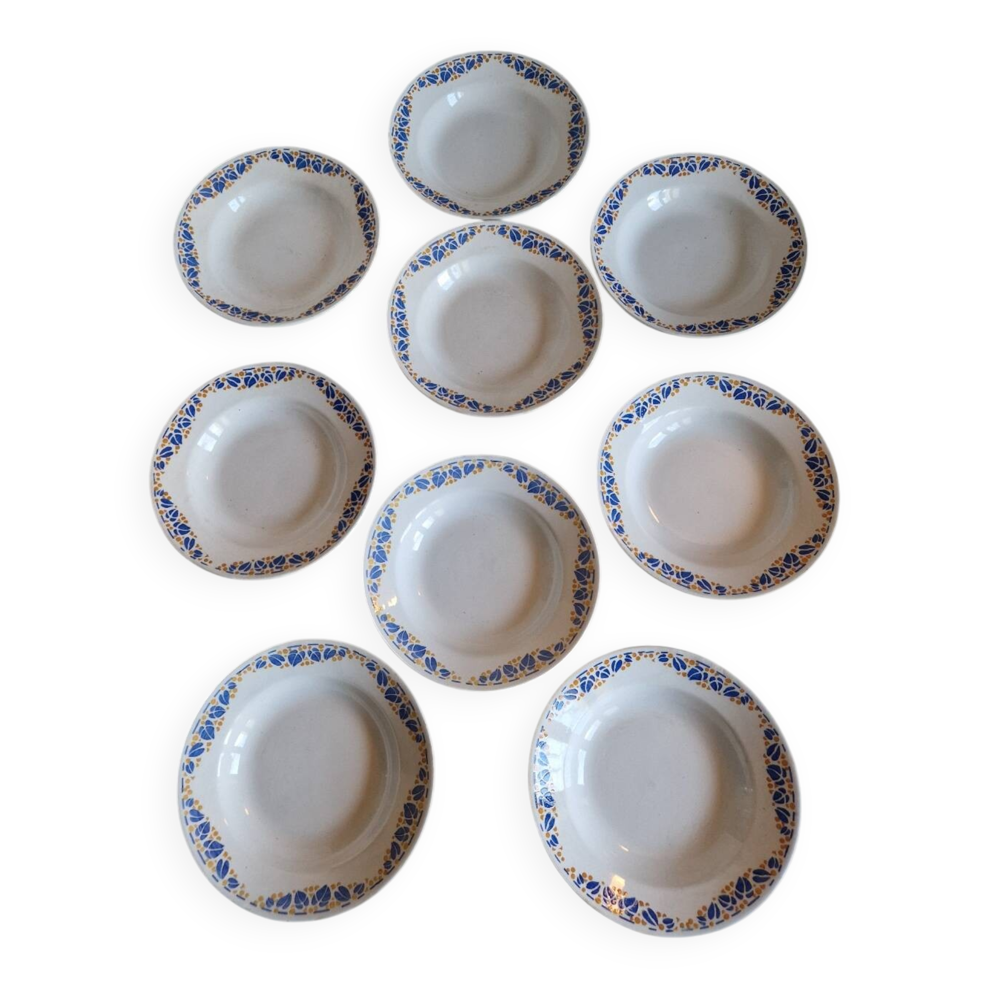 Set of 9 deep plates, earthenware from Creil Montereau, Colette model.