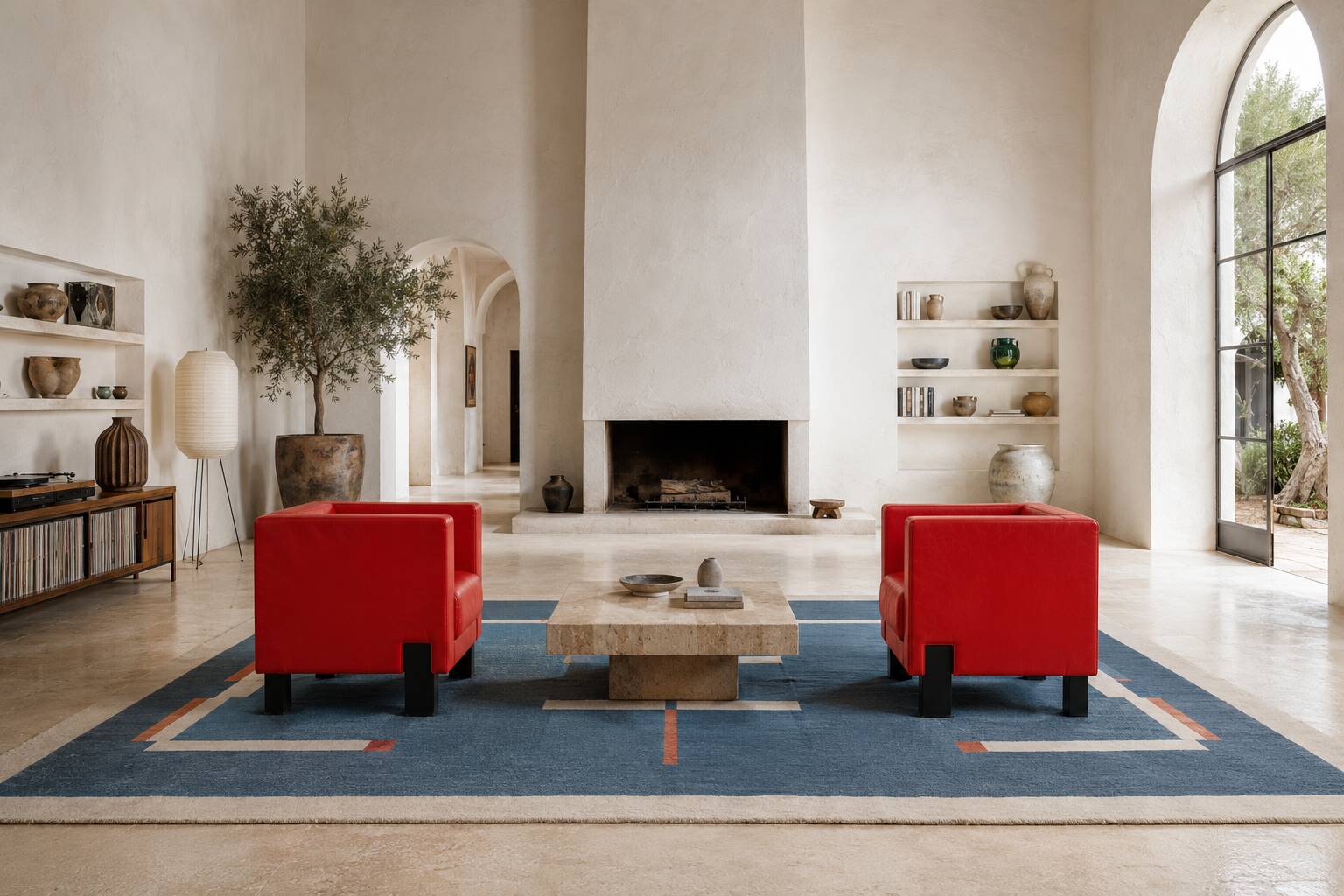 Uchida x Poltrona Frau — Pair of "Moji" armchairs in red leather
