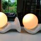 Pair of white ceramic wall lights from the 1970s.