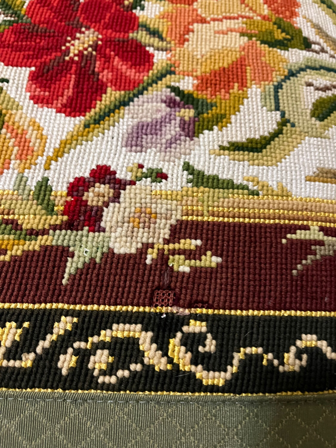 Vintage upholstered footstool, floral decor in Aubusson style.