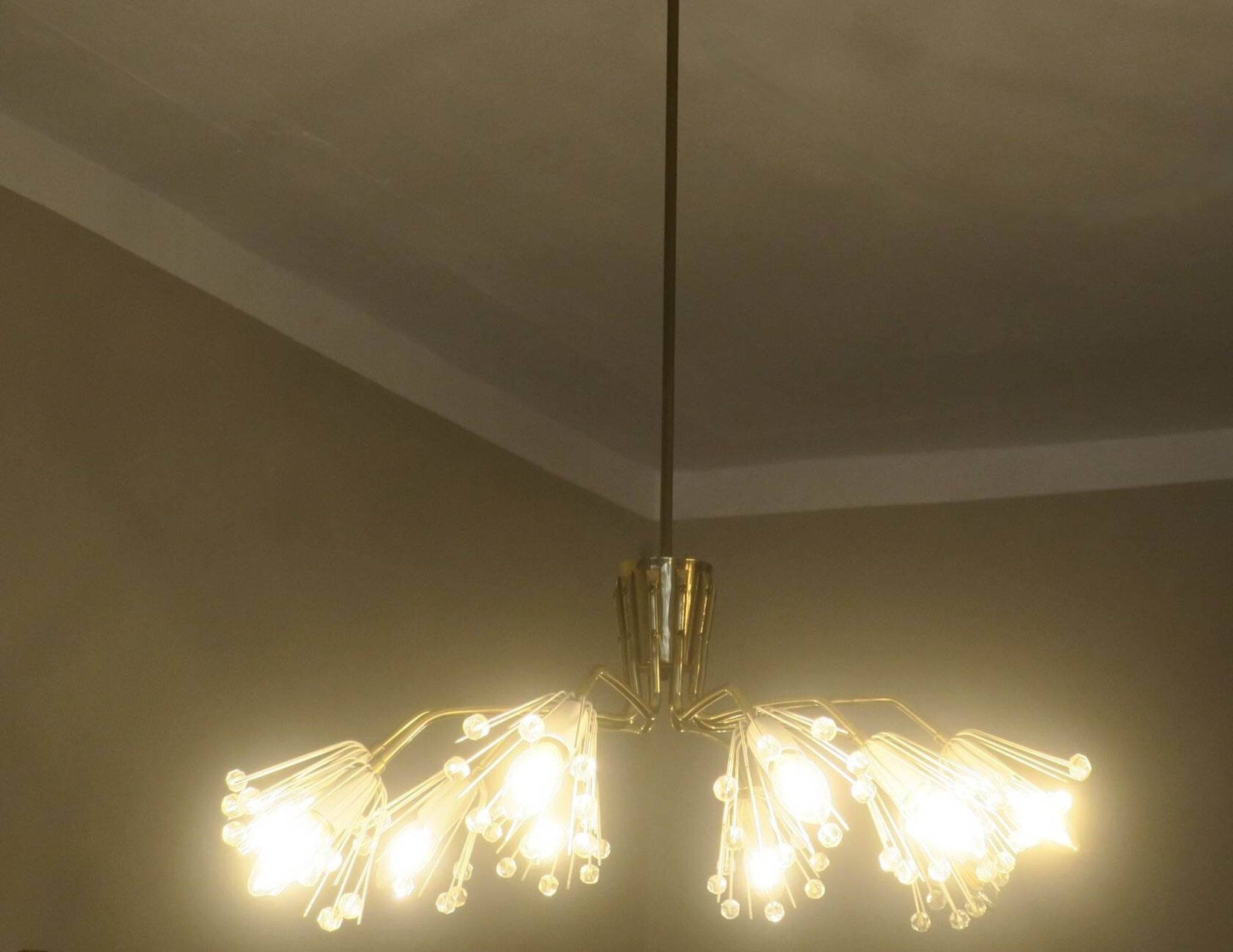 Elliptical brass and glass 10-arm chandelier, 1950s