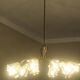 Elliptical brass and glass 10-arm chandelier, 1950s