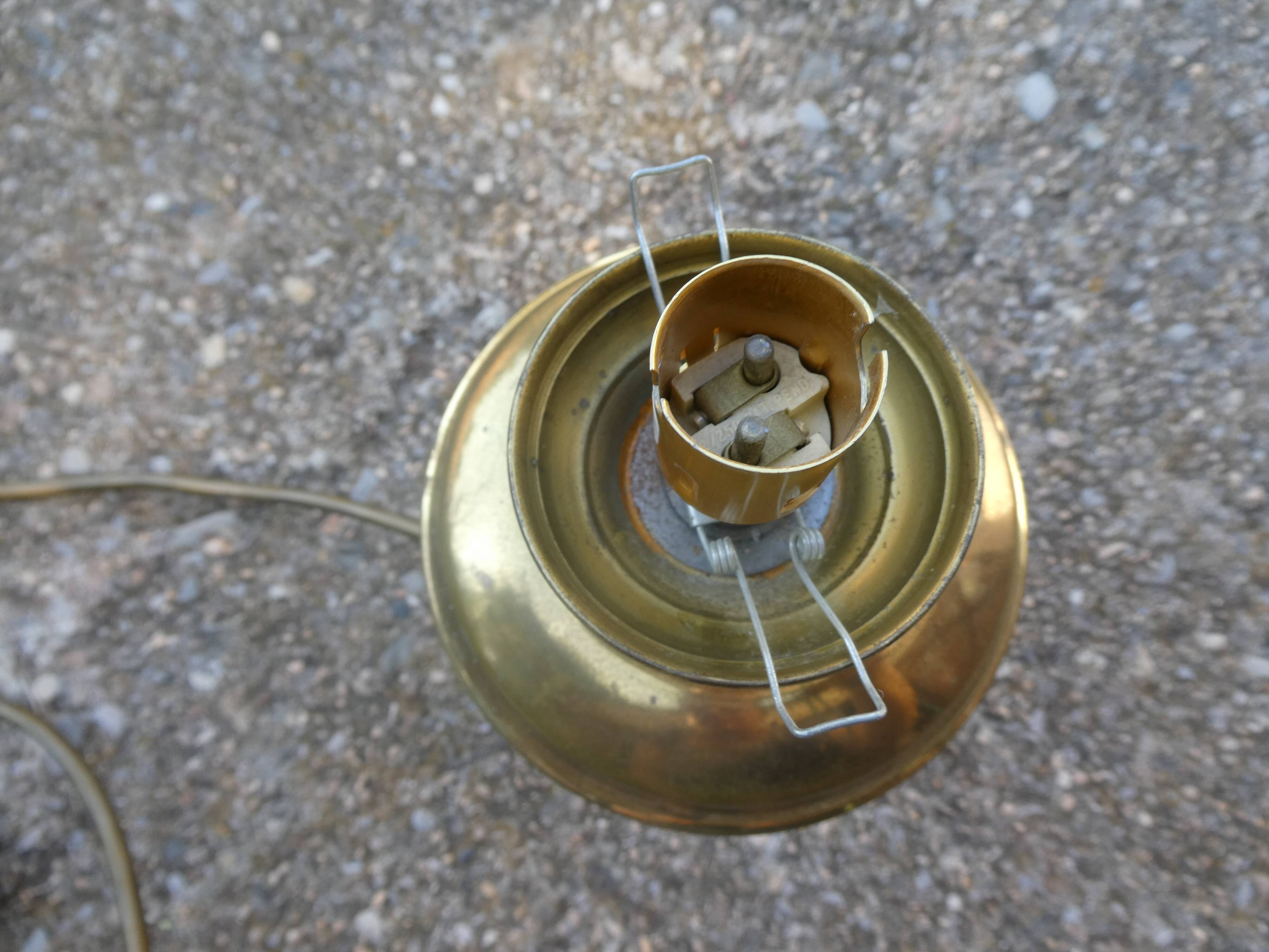 Vintage table lamp with chiseled glass globe.