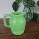 Green ceramic jug