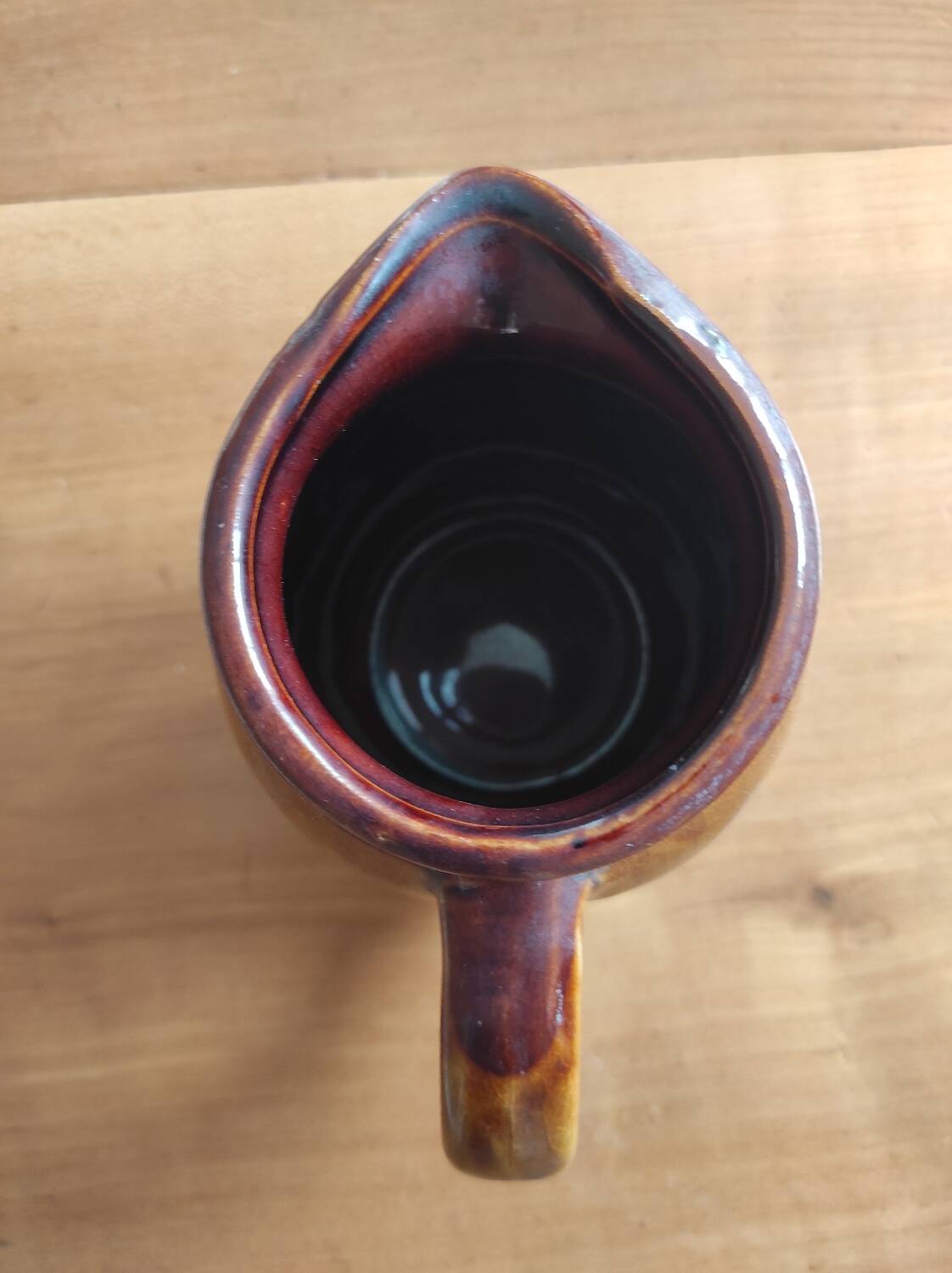 Glazed ceramic pitcher